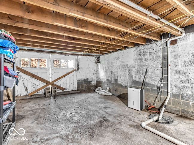 unfinished below grade area with concrete block wall | Image 20