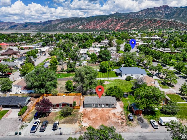 Aerial perspective of suburban area with mountains | Image 32