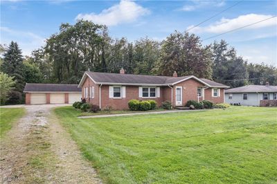 2654 & 2658 Sweitzer Road, Home with 4 bedrooms, 2 bathrooms and null parking in Uniontown OH | Image 2