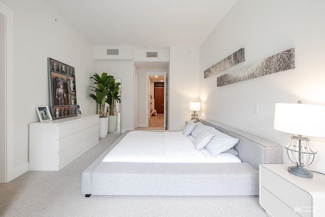 Carpeted bedroom featuring visible vents | Image 10