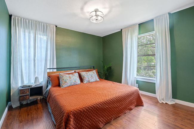 Large and bright primary bedroom with room for king bed. Large closets not shown. | Image 13