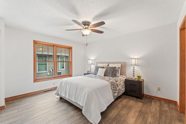 Main level primary bedroom with attached bathroom | Image 7