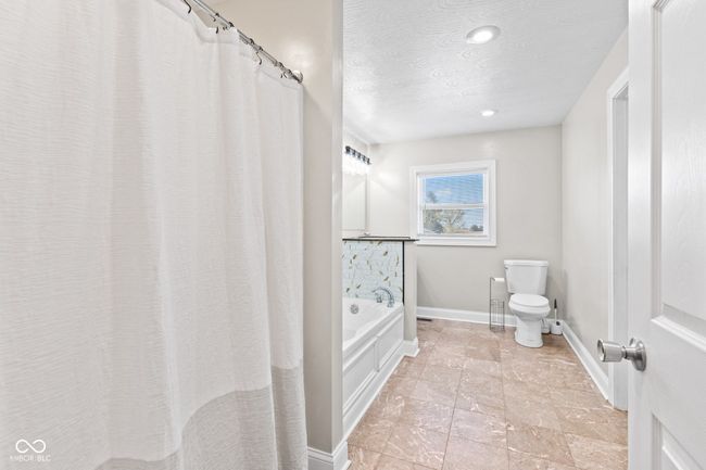 Hall Bathroom with separate shower and tub. | Image 39