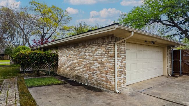 Garage featuring driveway | Image 11