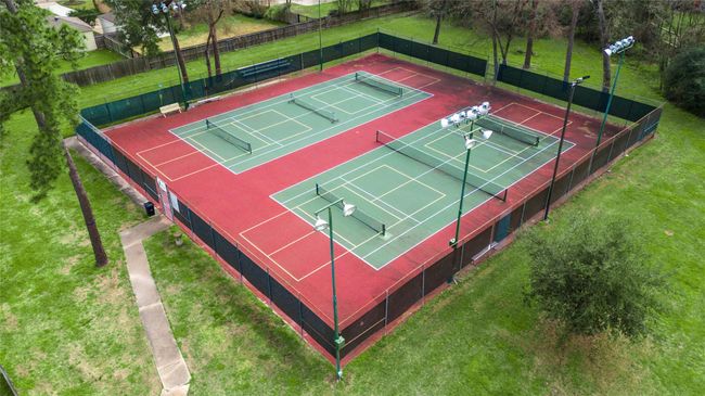 Get a great workout with your neighbors at the community tennis courts! | Image 48