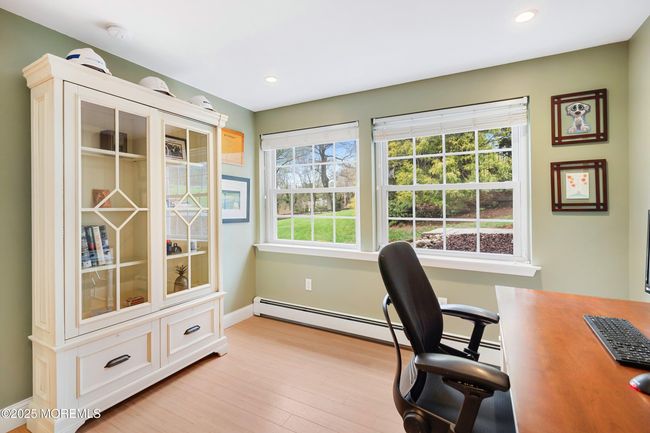 Bedroom/office has recessed lights, closet and storage area | Image 41