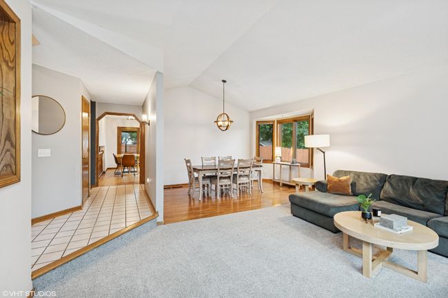 A great view of the family room flowing into the formal dining room | Image 7
