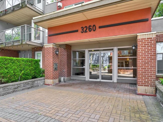 View of exterior entry featuring brick siding | Image 20