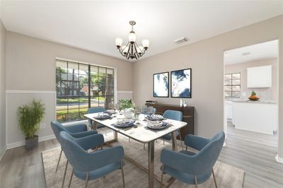 Whether hosting a dinner party with friends or savoring a meal with family this spacious dining area brings people together. The dining room flows seamlessly into a well-appointed chef's kitchen. Note: Virtually staged. | Image 3