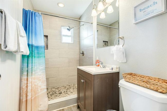 Primary bath with tiled shower | Image 11