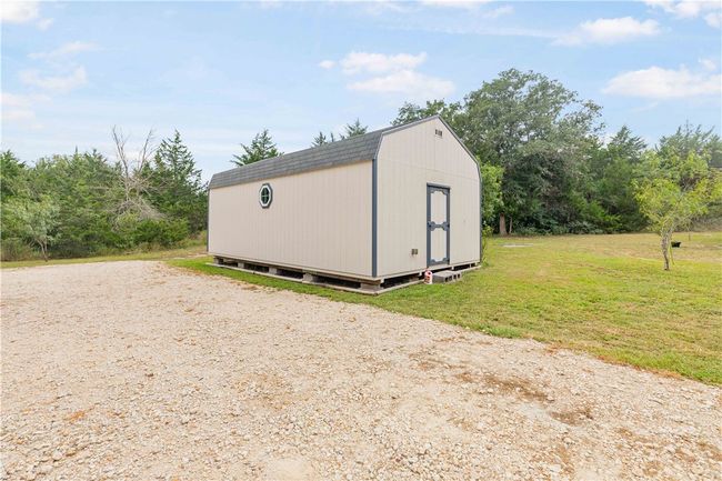 28x16 party barn, heated & cooled with laminate flooring and wood accent walls | Image 11