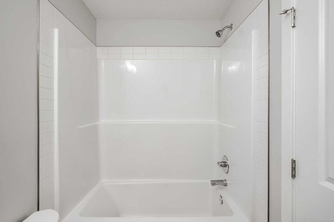 282 Canals Cross Sw, Townhouse with 3 bedrooms, 3 bathrooms and 2 parking in Airdrie AB | Image 24