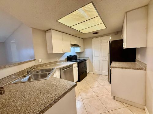 105-5065 Wiles Rd, Coconut Creek, FL, 33073-4211 | Card Image
