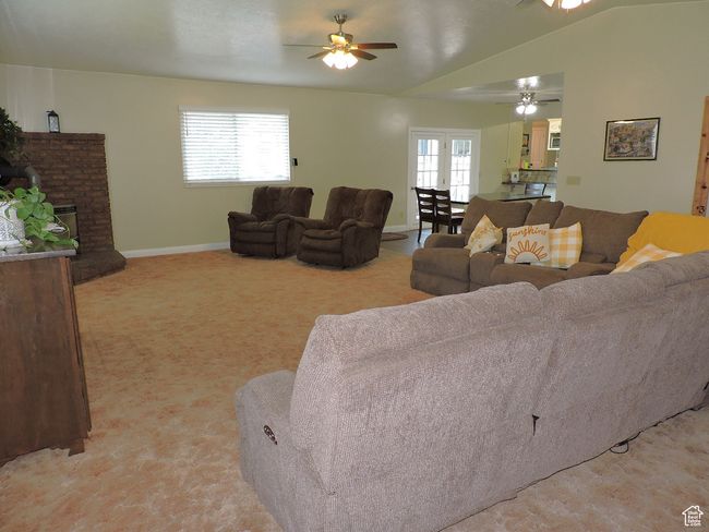 Great Room with Vaulted Ceilings Open to Dining & Kitchen | Image 18