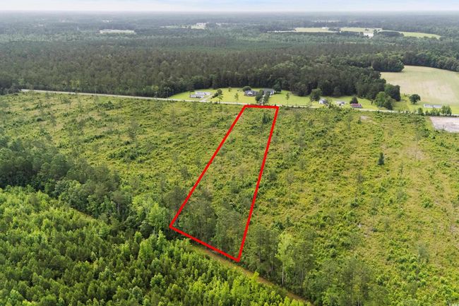Aerial view of sparsely populated area with property parcel outlined | Image 15