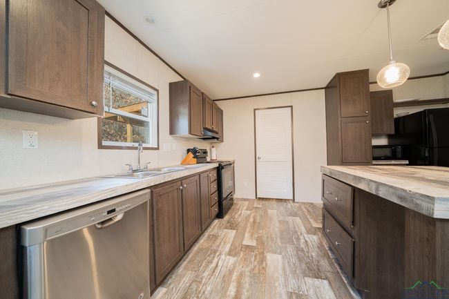 13975 State Highway 43 E, House other with 4 bedrooms, 2 bathrooms and null parking in Tatum TX | Image 9
