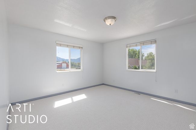 Empty room featuring baseboards and carpet flooring | Image 31