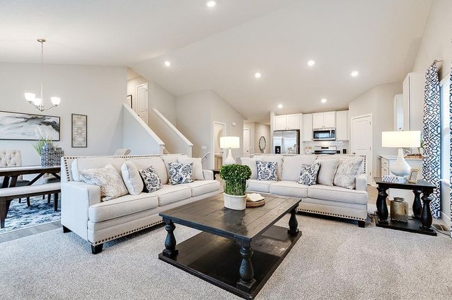 This massive cathedral vault hovers over the entire main level, equating in an openness rarely matched in new home design. Photo of model, colors and options will vary. | Image 9