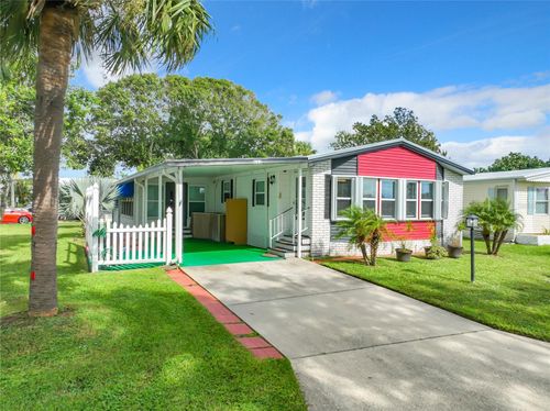 832 Periwinkle Cir, Barefoot Bay, FL, 32976-7673 | Card Image