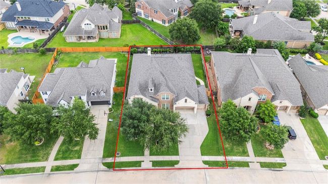 Aerial view of front yard of home. | Image 49