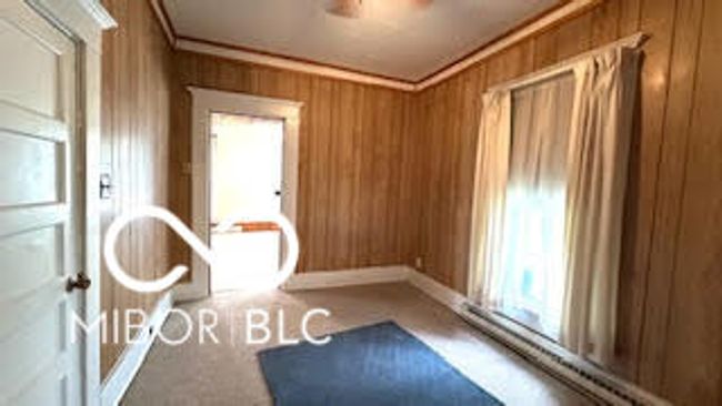 bonus room wiith ceiling fan | Image 9