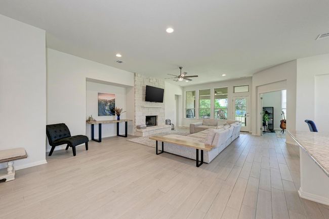 Spacious and bright, the sprawling open floor plan features plenty of space for a seating area or two in the Great Room. | Image 5