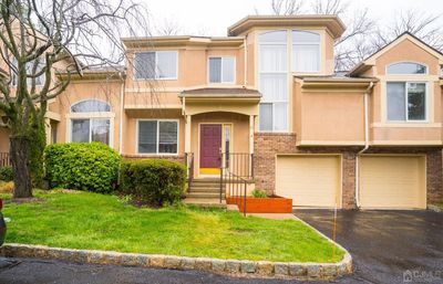 82 Kingsland Circle, Townhouse with 4 bedrooms, 2 bathrooms and null parking in South Brunswick NJ | Image 1