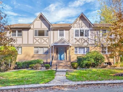 View of front of property featuring a front lawn | Image 1