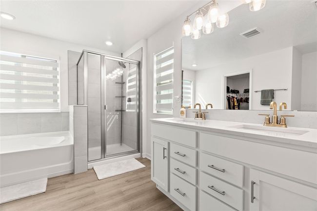 9104 Sandy Bluffs Cir, House other with 4 bedrooms, 3 bathrooms and null parking in PARRISH FL | Image 22