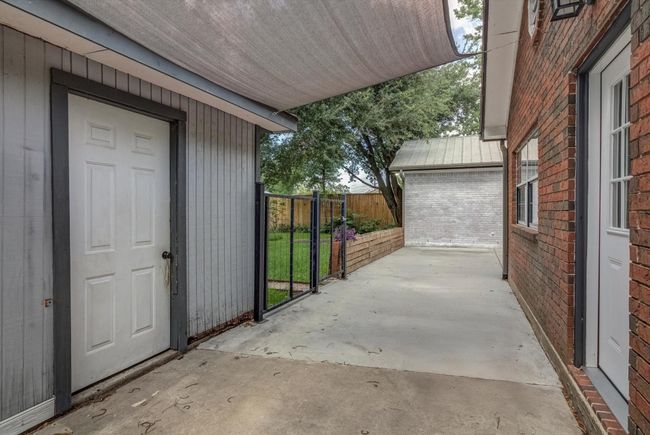 Garage entrance and backdoor to house. | Image 21