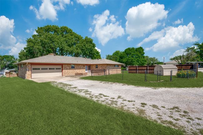 2 car garage with additional parking space. Pet House with AC | Image 10