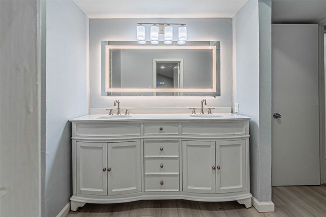 Bathroom with vanity and wood-type flooring | Image 24