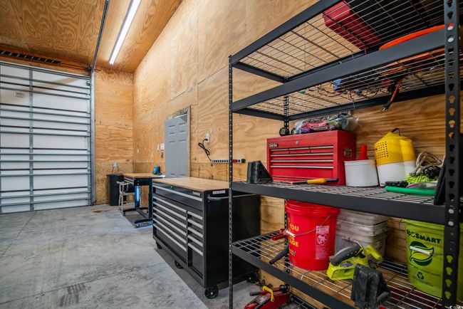Garage featuring electric panel | Image 19