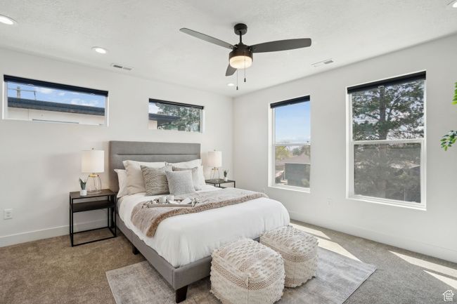 Carpeted bedroom featuring recessed lighting, visible vents, and baseboards | Image 16