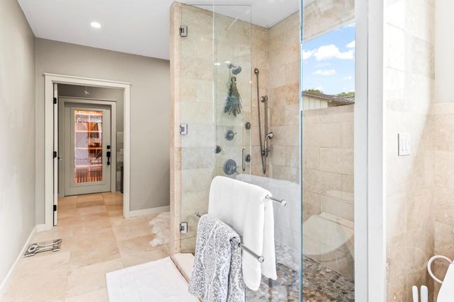 Bathroom featuring a stall shower, baseboards, and recessed lighting | Image 20