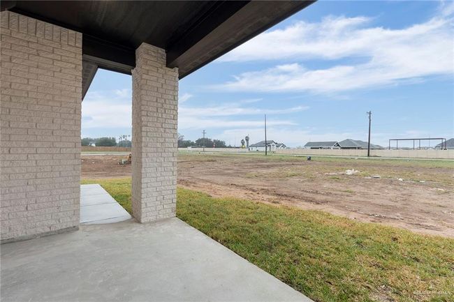 View of yard with a patio | Image 16
