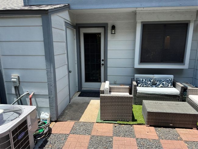 View of exterior entry featuring outdoor lounge area | Image 18
