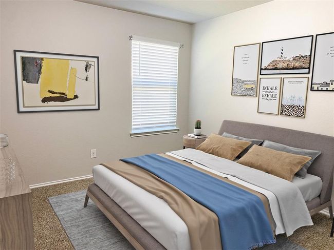 A cozy bedroom with neutral tones, with room for full size bed, ready for your personal decor and style. A window provides natural light, with space for a small side table and neutral textured carpet. | Image 7
