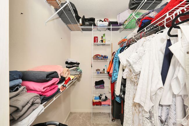 Spacious closet featuring carpet floors | Image 30