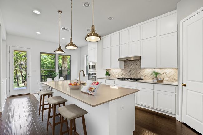 **Virtually Staged Gourmet Kitchen + Breakfast Nook** | Image 5
