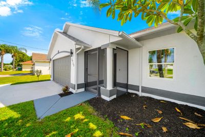 3240 Se West Snow Road, House other with 4 bedrooms, 2 bathrooms and null parking in Port St Lucie FL | Image 3