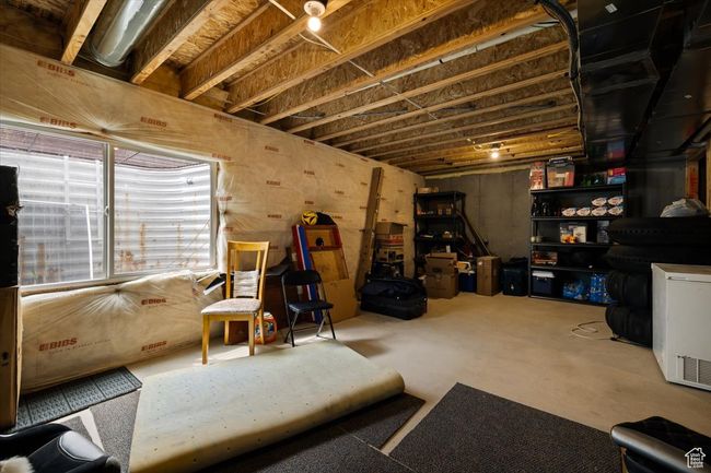 Basement featuring refrigerator | Image 29