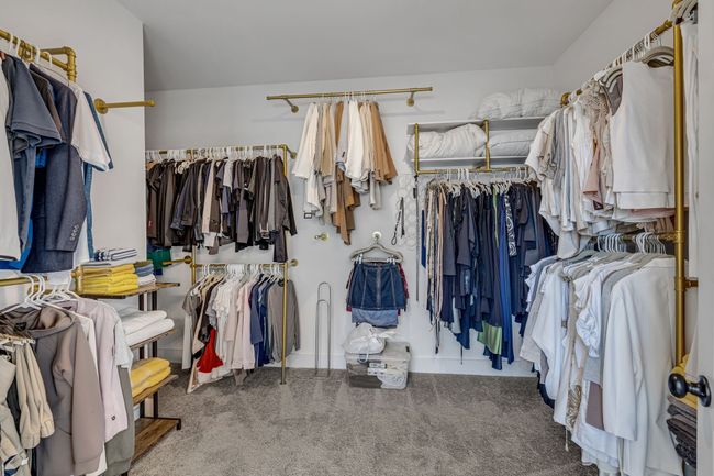 Walk-in closet attached to the owner's bath. | Image 11