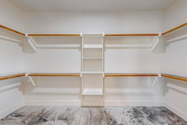 View of spacious closet | Image 27
