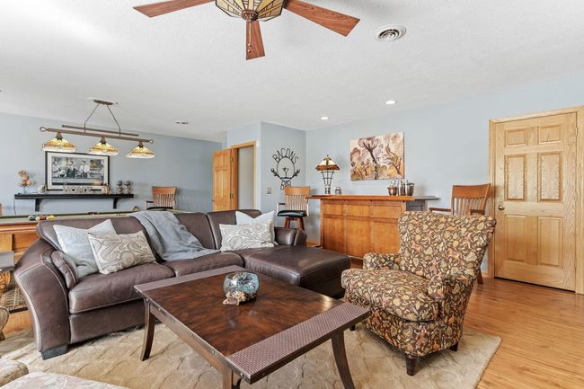 Great family room with multiple spaces for activities. | Image 44