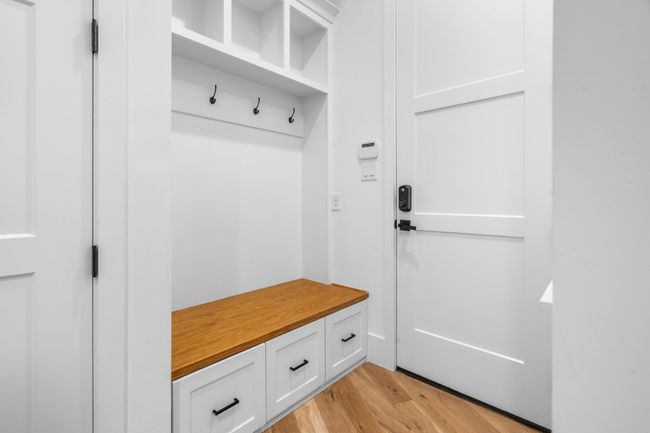Mudroom featuring light wood-style flooring | Image 26