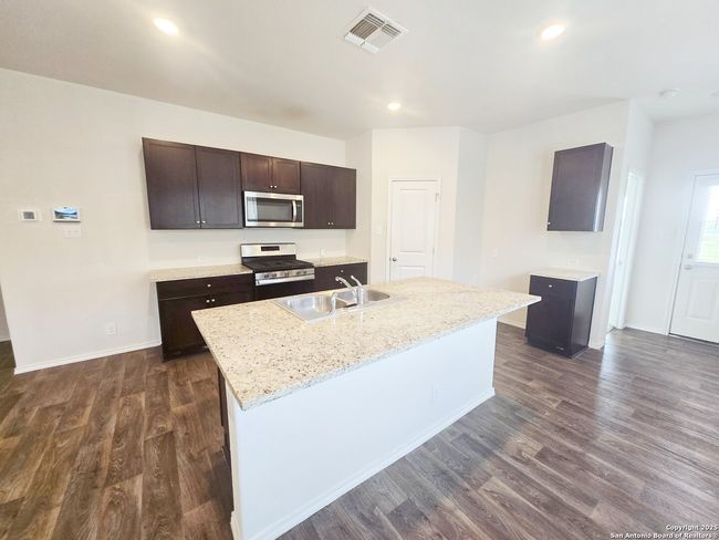 437 Middle Green Loop, House other with 3 bedrooms, 2 bathrooms and null parking in Floresville TX | Image 6