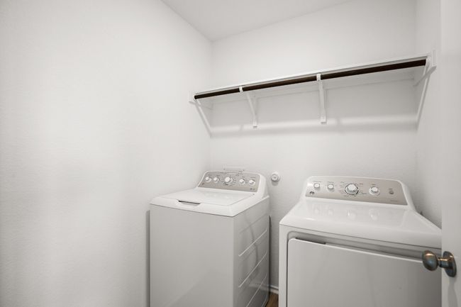 Laundry room with independent washer and dryer | Image 23