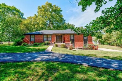 406 N Madison Street, House other with 3 bedrooms, 2 bathrooms and null parking in Raymore MO | Image 1