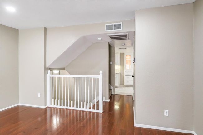 Bonus room featuring wood finished floors and baseboards | Image 11